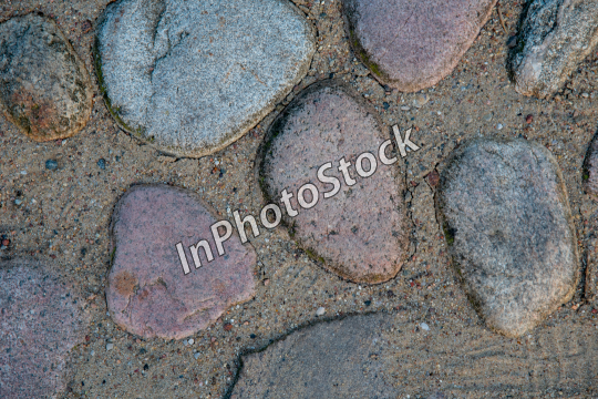 Stone road. Stones placed in the ground